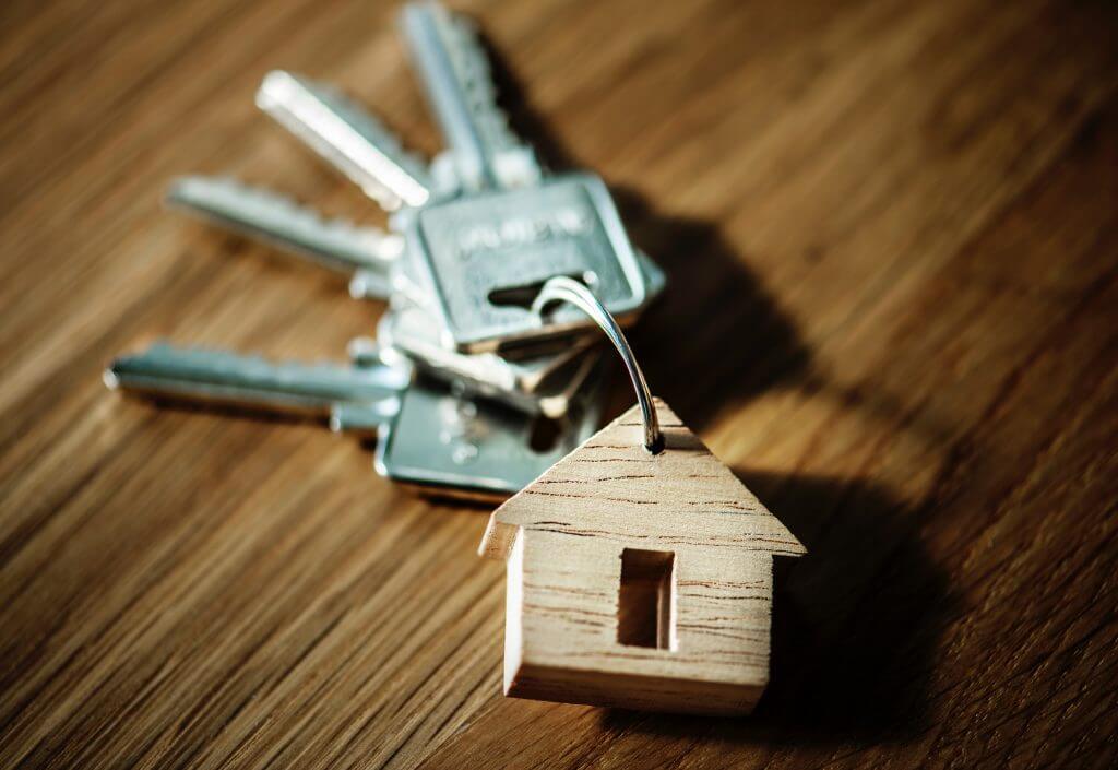 chaveiro em formato de casa, representando o fundo imobiliário.